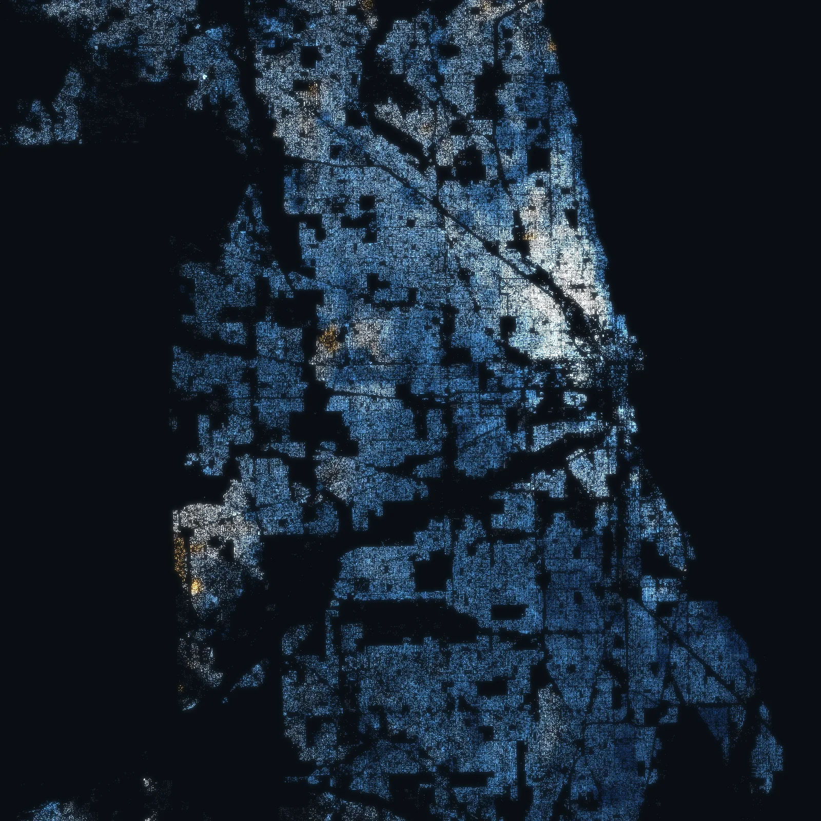 Chicago and Cook County at night: every parcel with a declared sale a point of light, coloured by the median price of the homes declared around it
